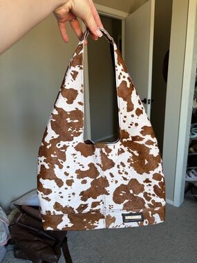 Cowhide hobo shoulder bag